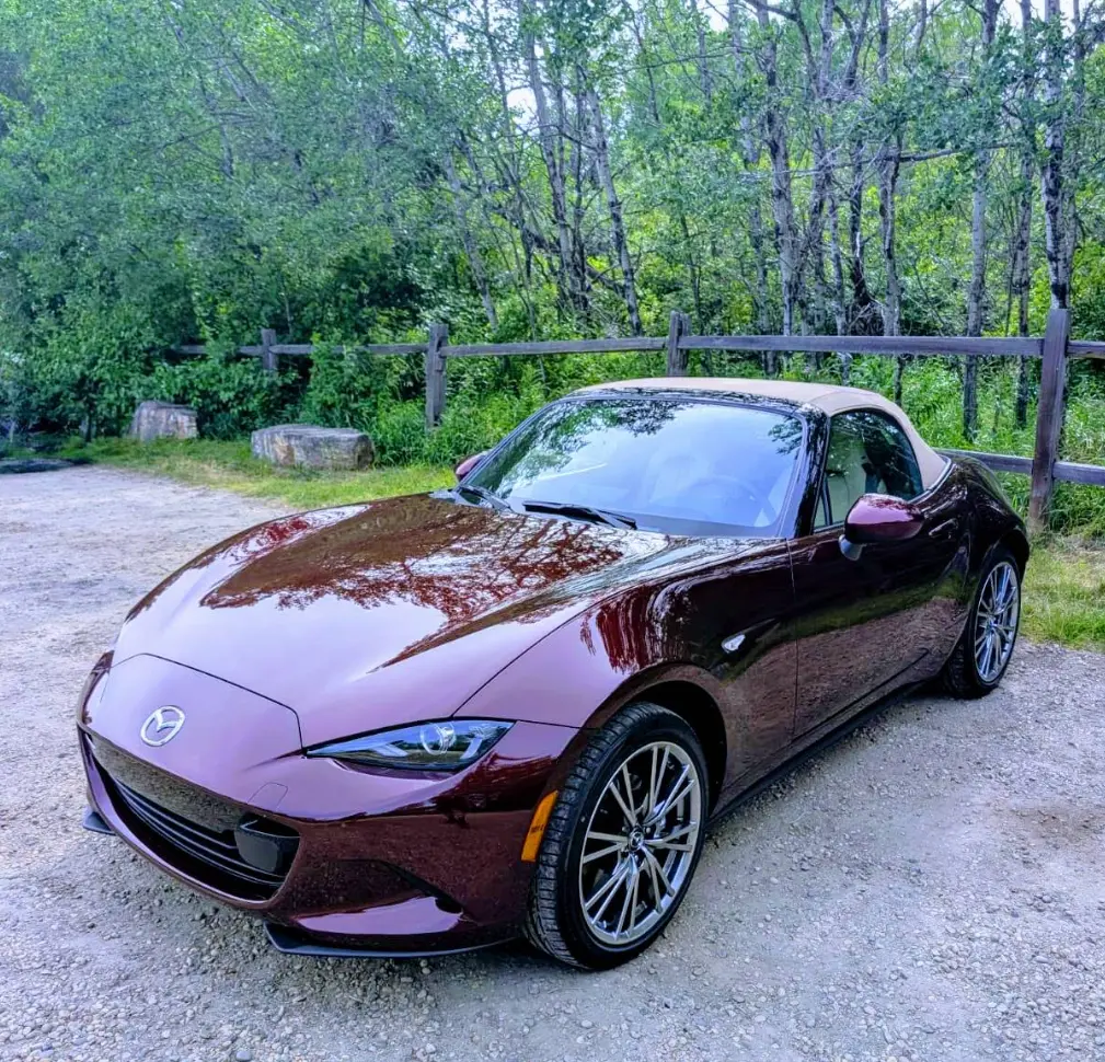 Burgundy Mazda convertible financed through Alberta Lease Finance